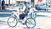 Delivery of Yakult drinks on a Yakult-branded bicycle in Fukushima City. Photo credit: Mikael Colville-Andersen